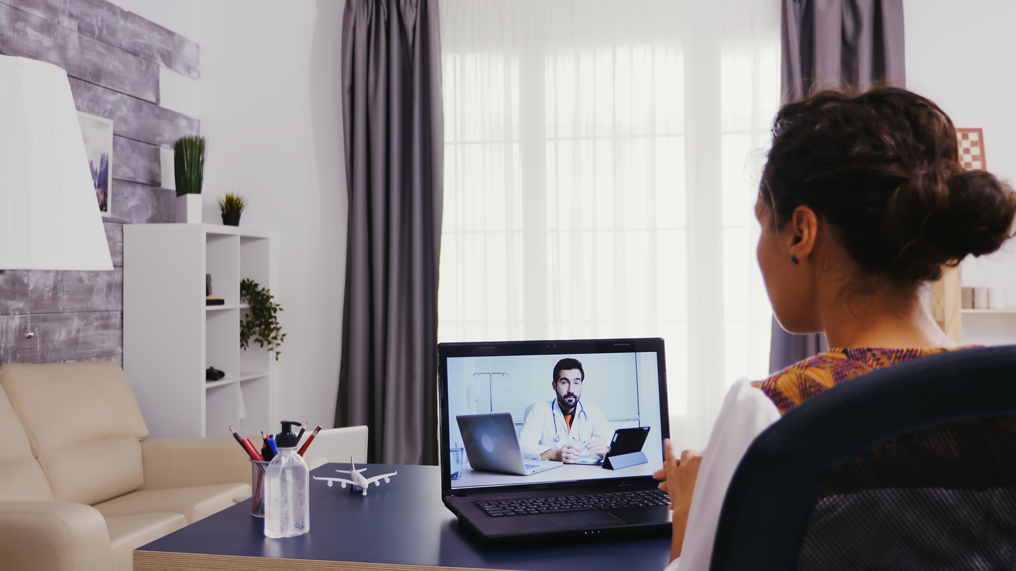 Woman in time of video consultation